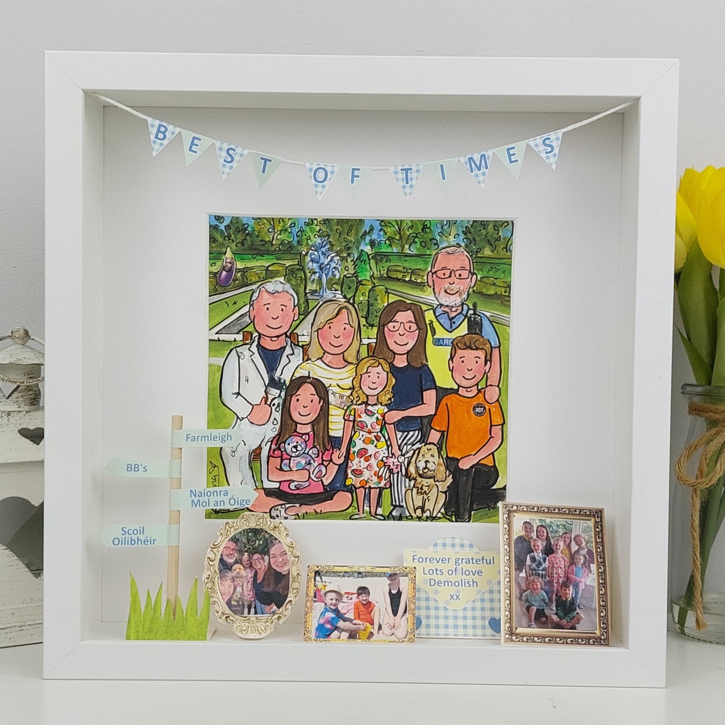 Framed family portrait with 'Best of Times' banner, surrounded by decorative elements.