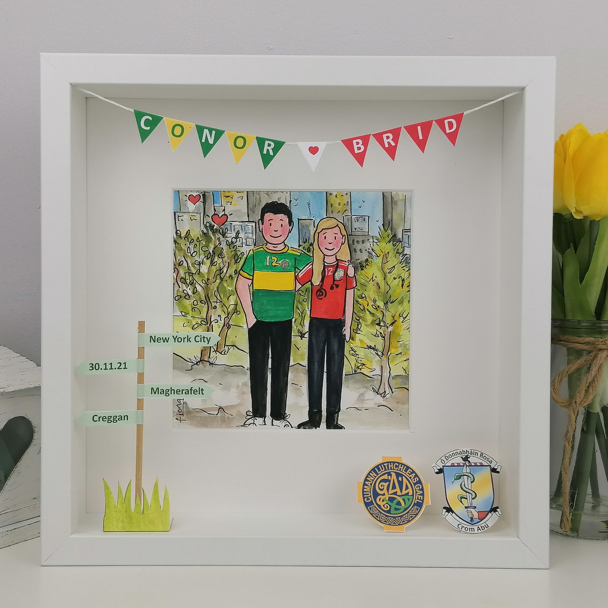 Decorative shadow box with a cartoon illustration of a couple, New York gaelic game