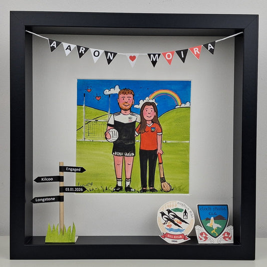 Framed artwork of a couple on a sports field with decorative elements.