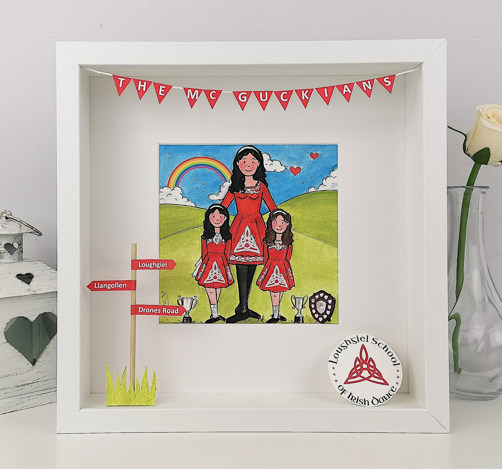 A personalized 3D artwork featuring cartoon-style Irish dancers in a colorful background, framed in a white box frame.
