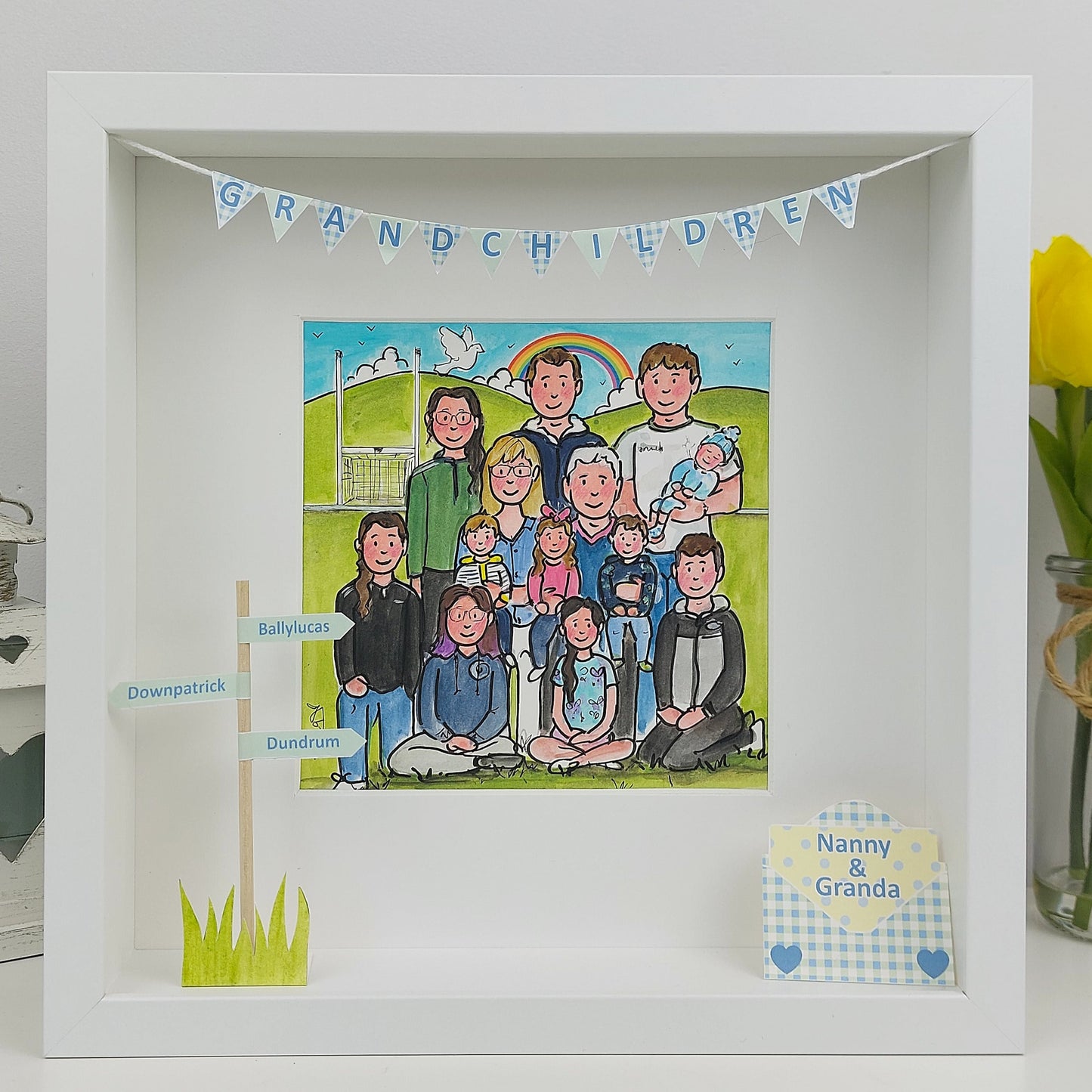 Framed illustration of a family group with 'Grandchildren' banner on a white background.