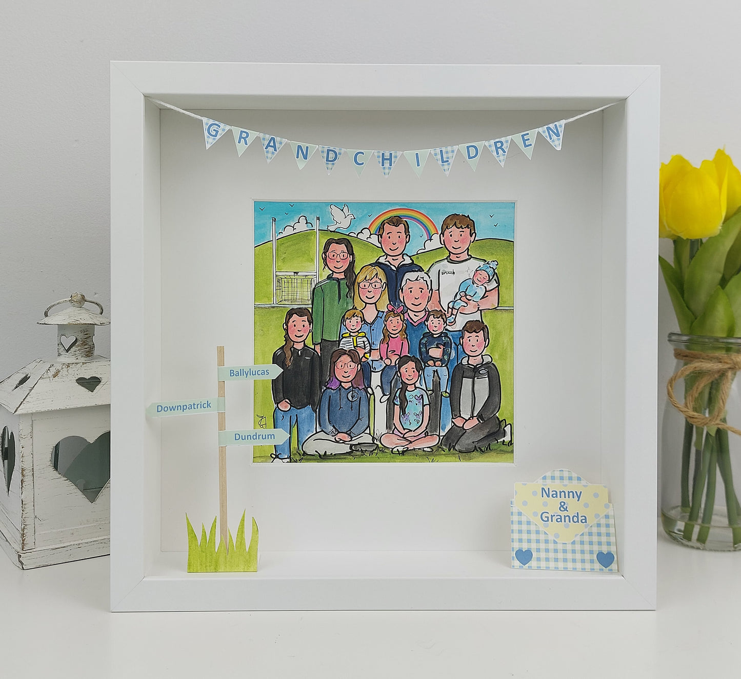 Framed illustration of a family with 'Grandchildren' banner on a white background